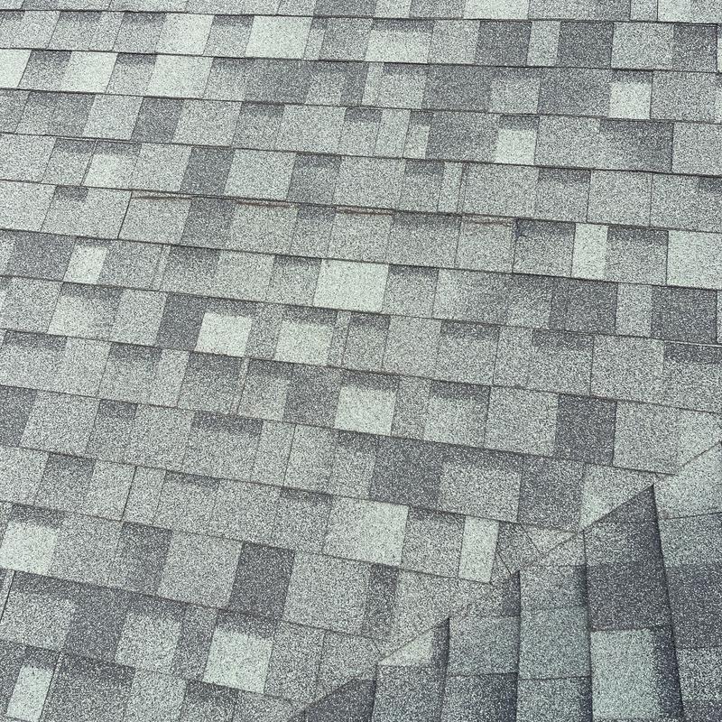Asphalt roof shingles with patch repair in Canal Winchester Asphalt roof shingles with patch repair in Canal Winchester