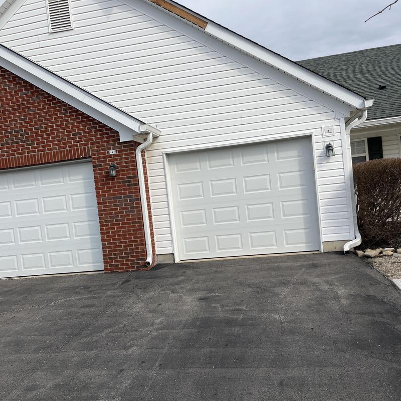 Garage fascia and soffit repair on white siding Garage fascia and soffit repair on white siding