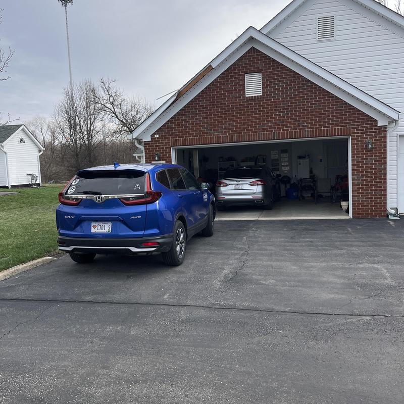 Fascia board along brick and siding exterior roofline Fascia board along brick and siding exterior roofline