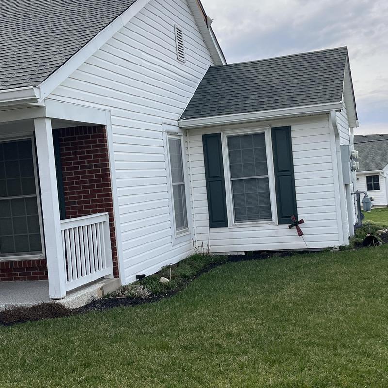 Fascia boards on white house exterior with siding Fascia boards on white house exterior with siding