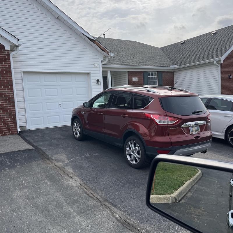 Fascia board at roof edge with partial damage Fascia board at roof edge with partial damage