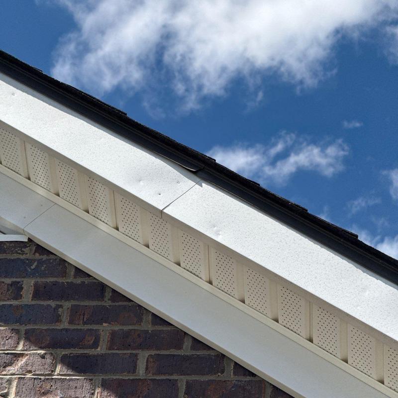Ridge cap with hail damage on roof edge