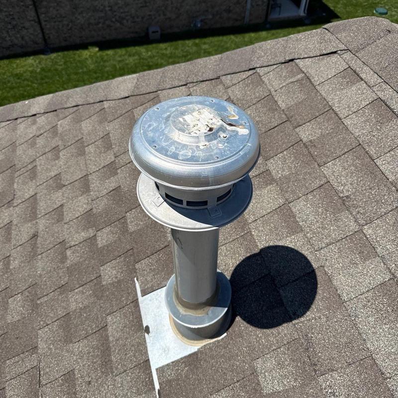 Roof vent flashing and shingle roof inspection