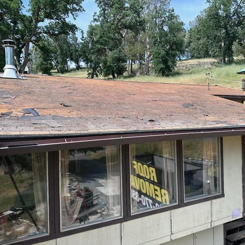 Asphalt shingle roof with weather damage in Groveland, CA