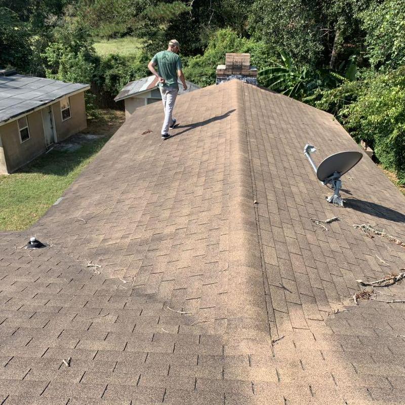 Asphalt shingle roof inspection with satellite dish