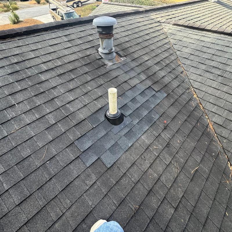 Pipe boot and surrounding shingle roof repair