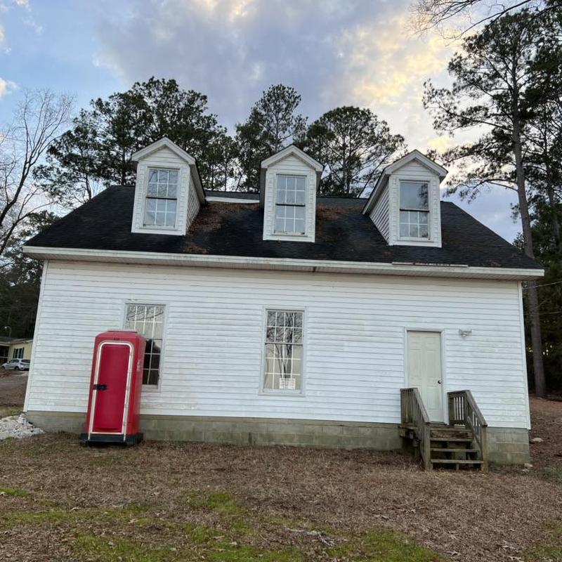 Dormer roof and siding needing renovation