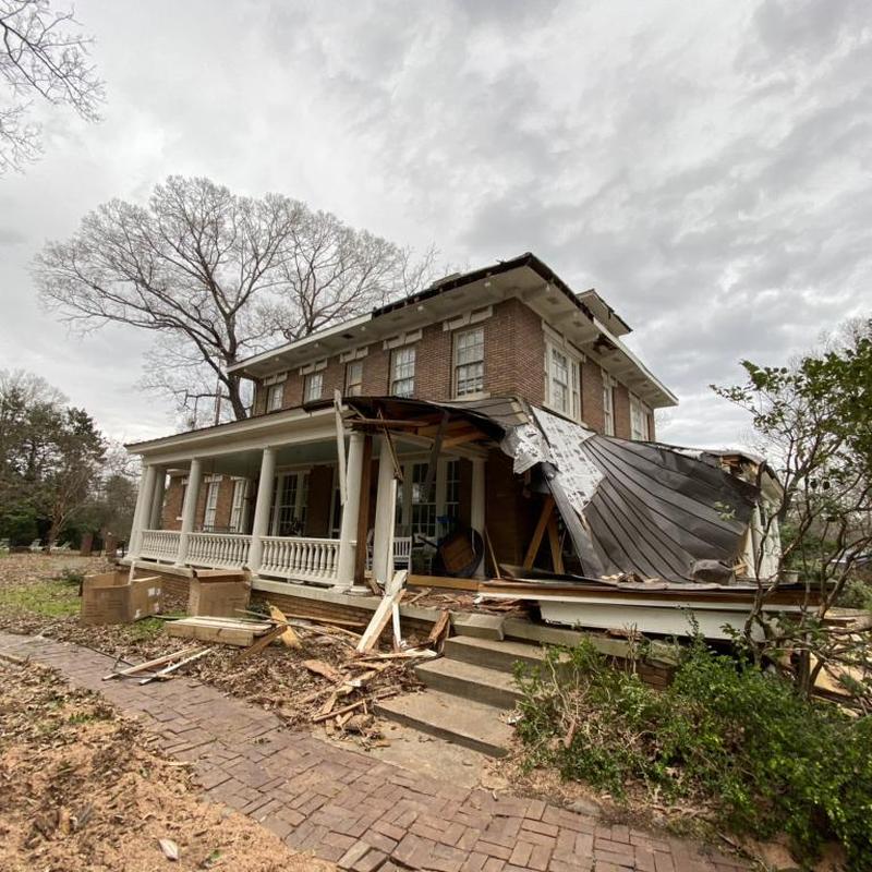 Porch and roof storm damage on historic home Porch and roof storm damage on historic home