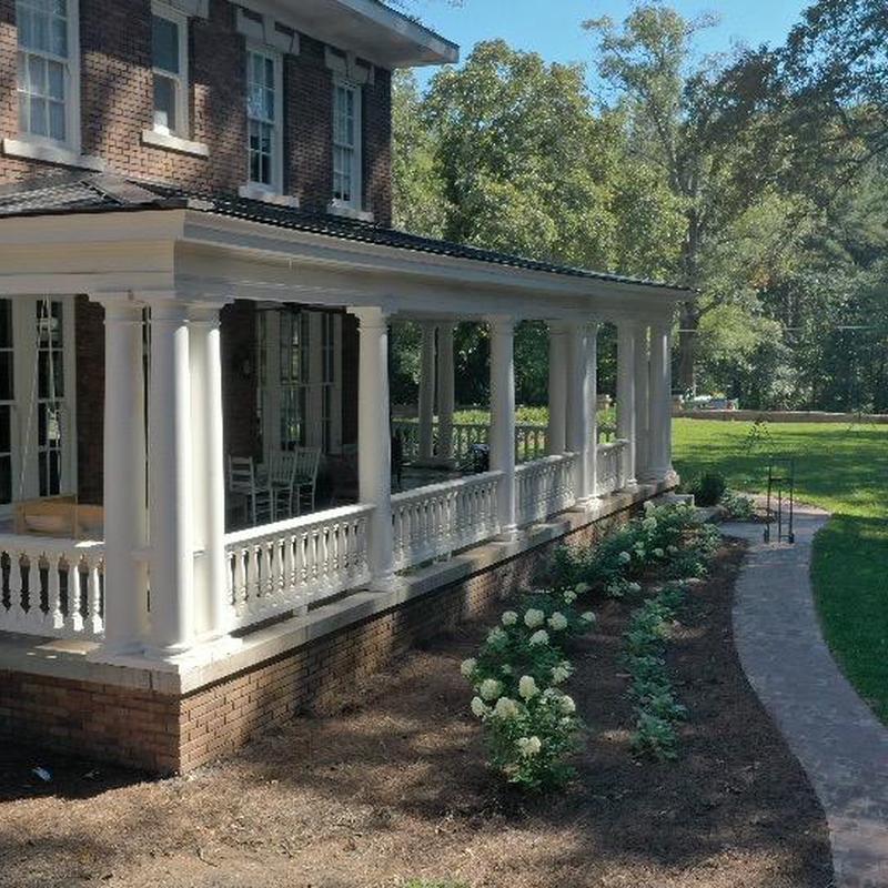 Porch columns and railing on historic Greenwood home Porch columns and railing on historic Greenwood home