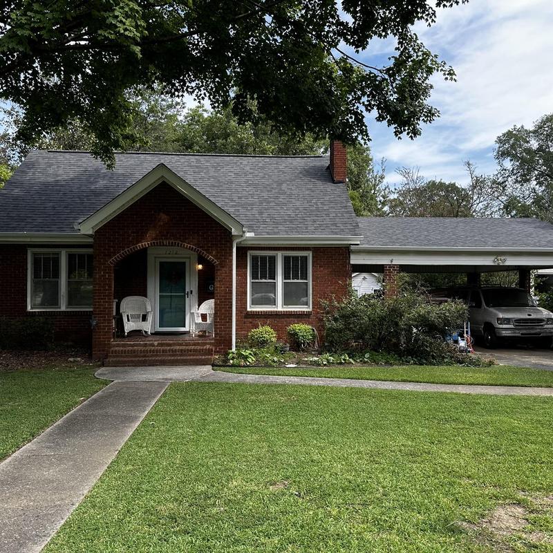 Owens Corning Oakridge Williamsburg Gray roof with gutters