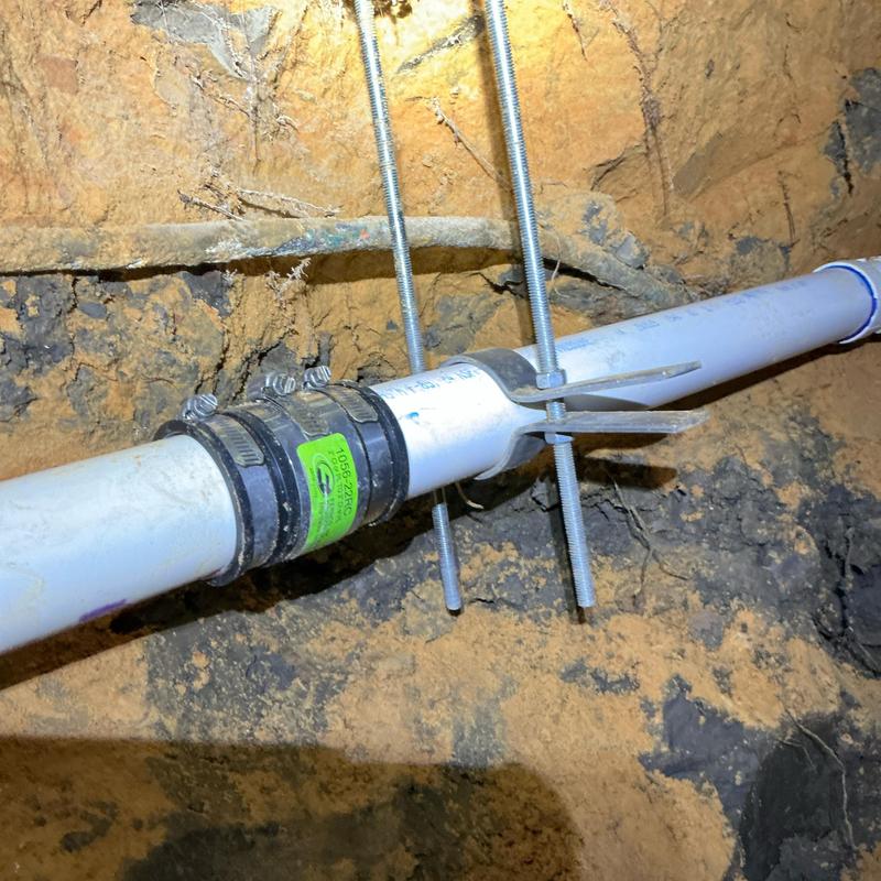 2-inch PVC kitchen drain pipe with repair coupling