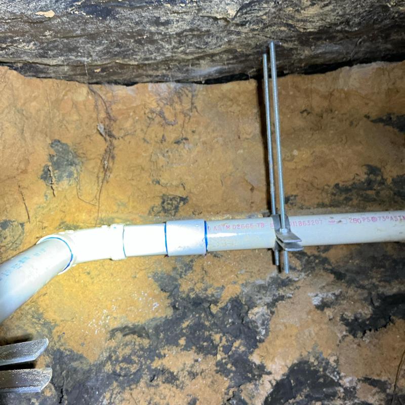 2 inch PVC kitchen drain line under home tunnel