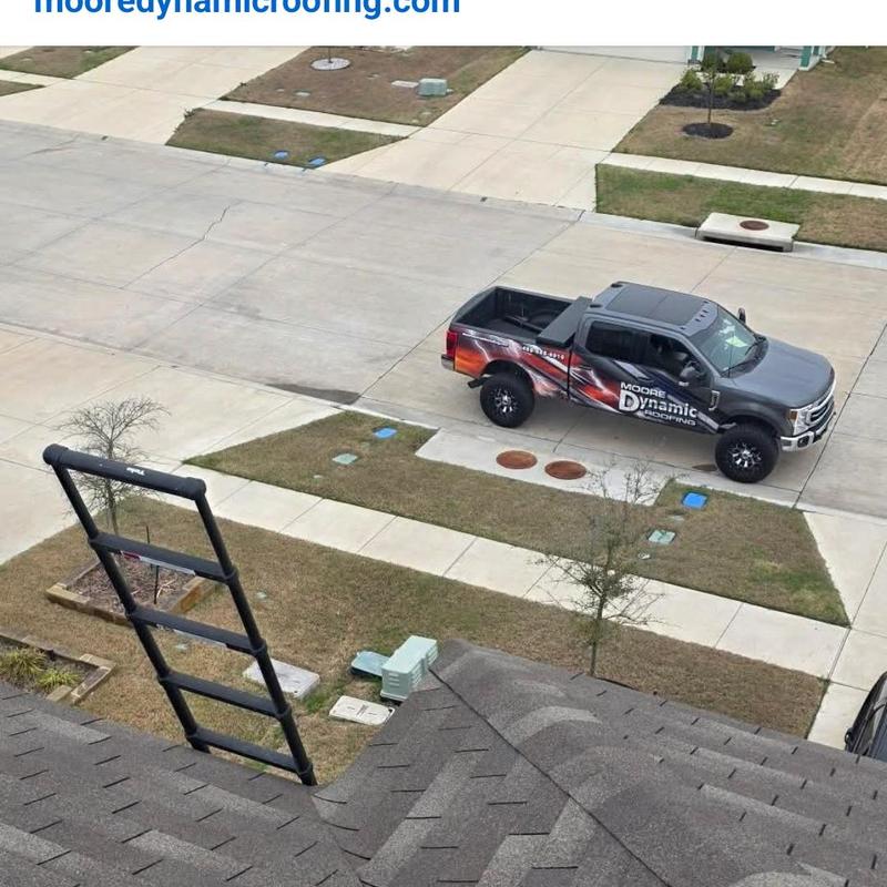 Asphalt shingle roof with hail damage inspection