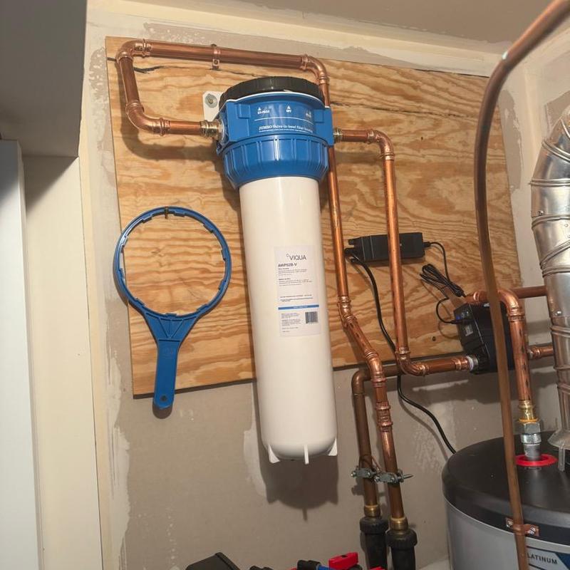 Whole home water filtration system with copper piping