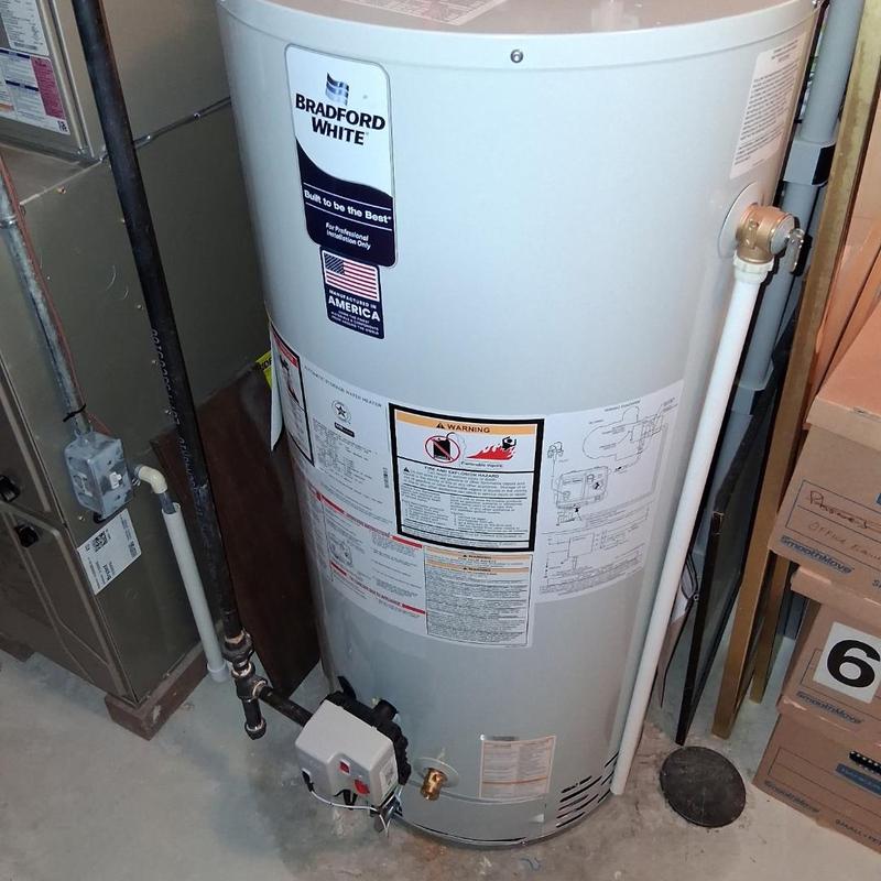 Power vented water heater installation in basement