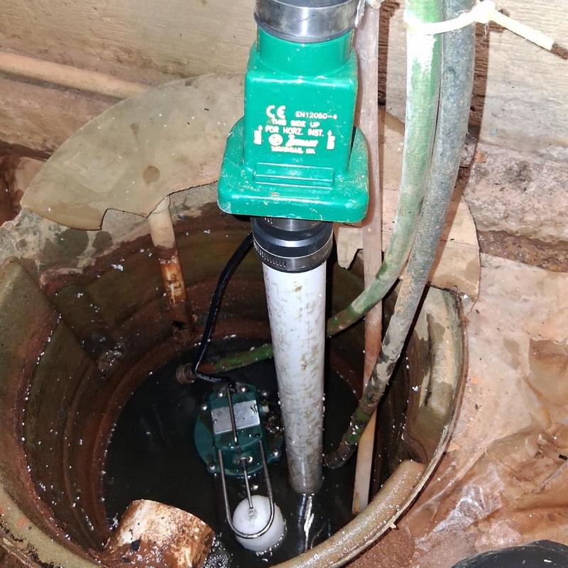 Sump pump system with float switch and pipes