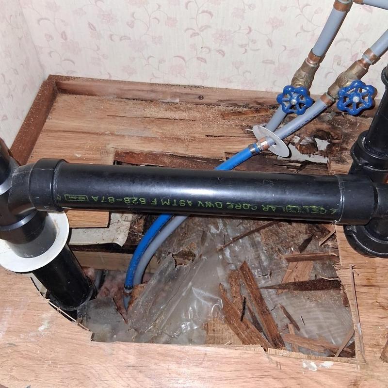 Vanity water supply lines with pipe damage under floor