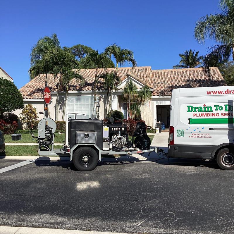 Hydro jetting equipment and plumbing van at residence