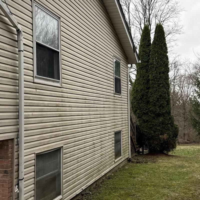 Vinyl siding and gutter inspection for hail damage Vinyl siding and gutter inspection for hail damage