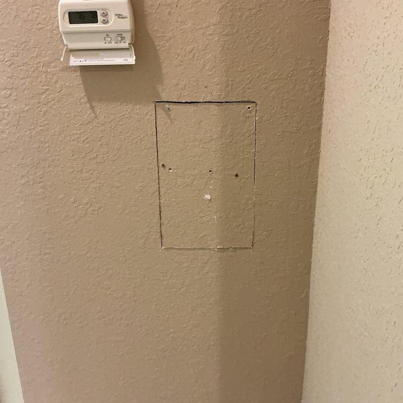 Wall access panel cutout below thermostat