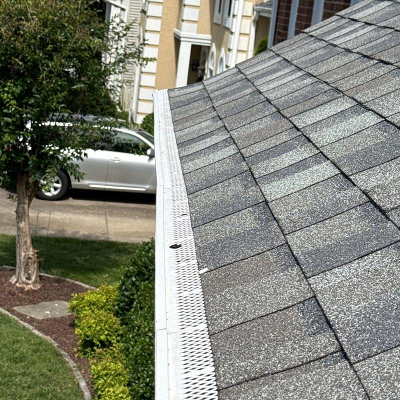 Roof shingles and gutter guard inspection with hail damage