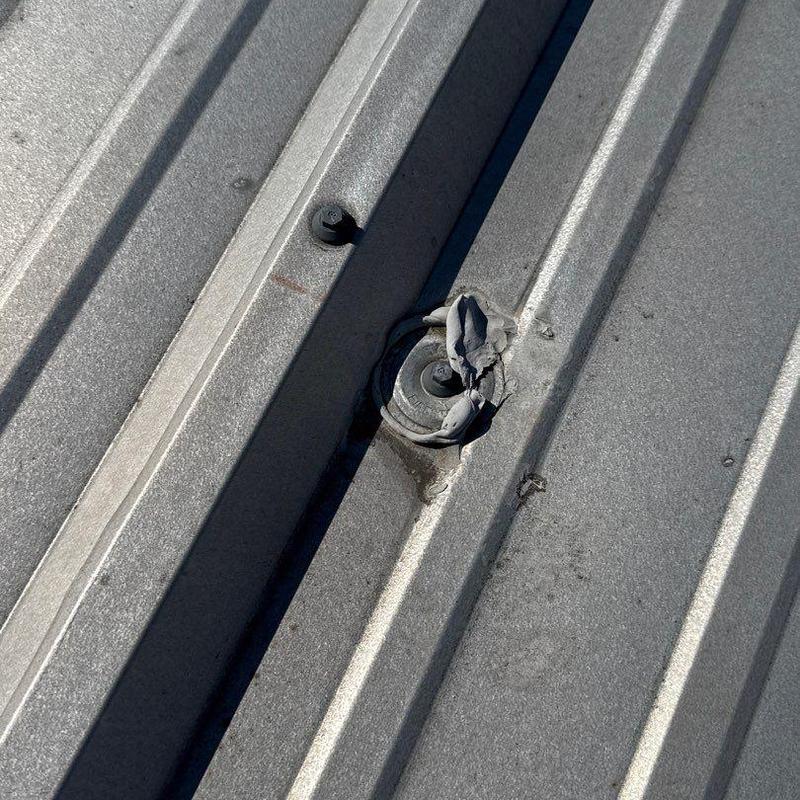 Metal roofing fastener with sealant damage