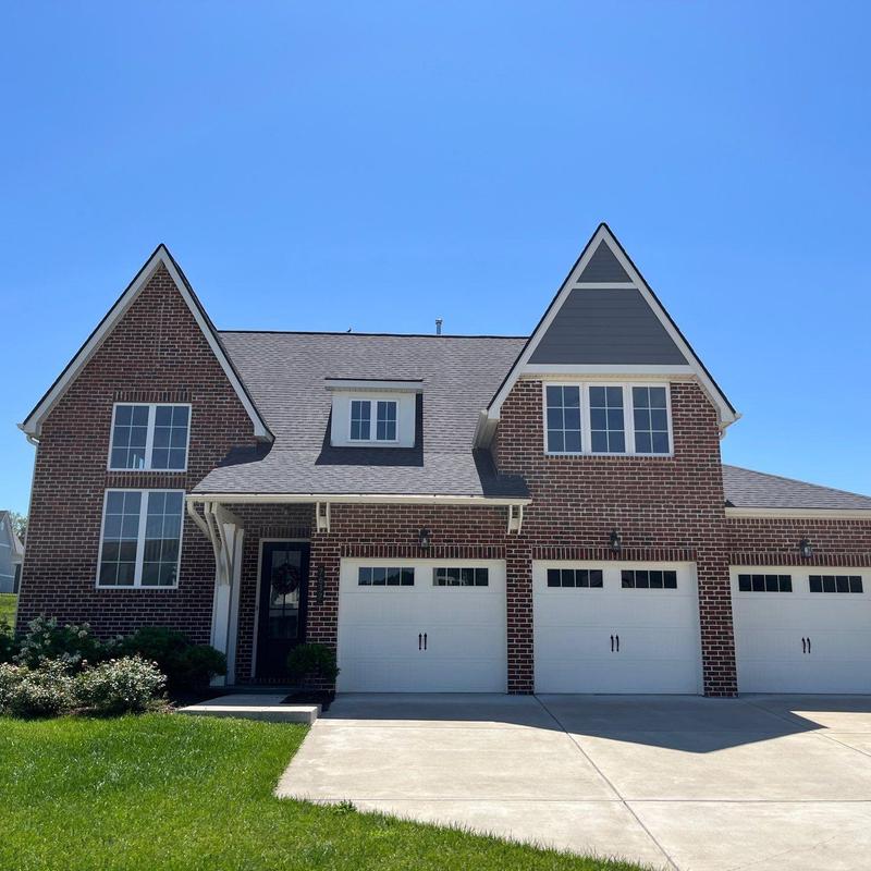 Asphalt shingle roof with hail damage inspection