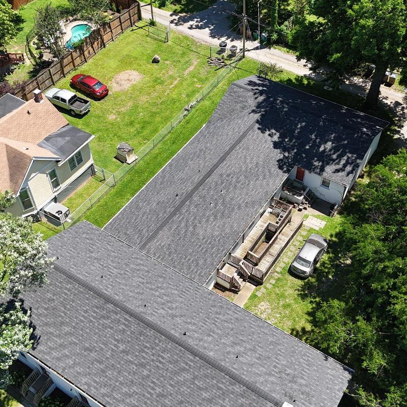 Asphalt shingle roof with hail damage inspection