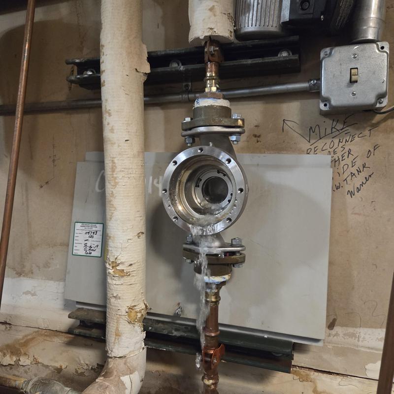 Hot water valve leaking with surrounding piping