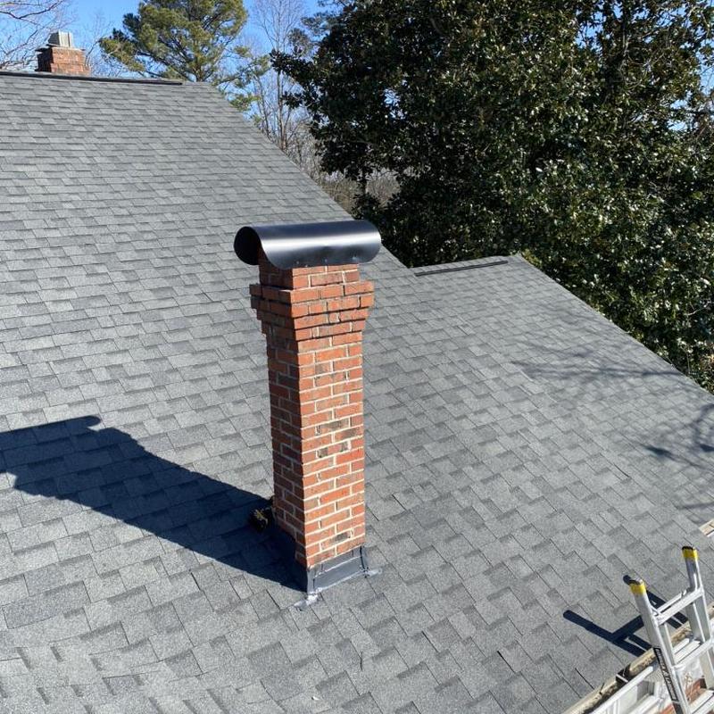 Williamsburg Gray shingle roof with brick chimney Williamsburg Gray shingle roof with brick chimney