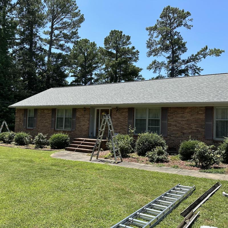 Estate Gray roof shingles with new gutters installation Estate Gray roof shingles with new gutters installation