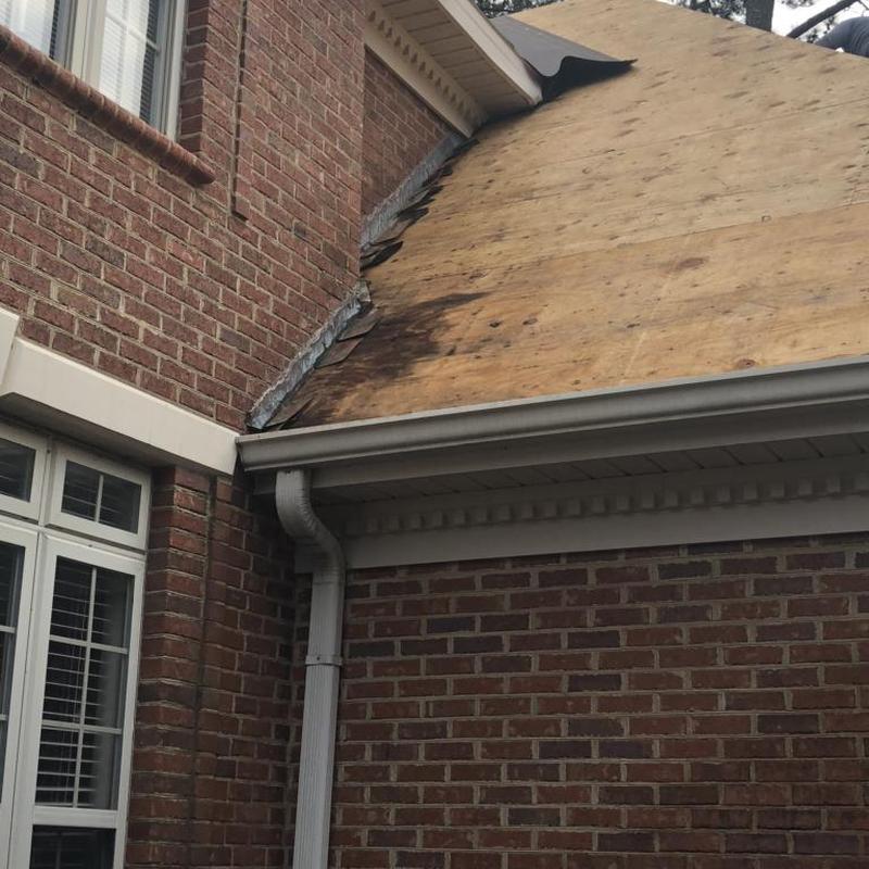 Plywood roof decking on brick residential house