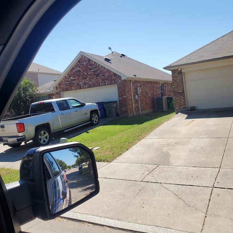 Asphalt shingle roof with hail damage overview