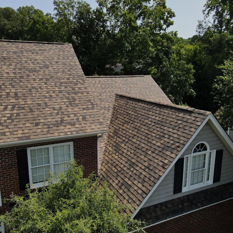 IKO Dynasty Brownstone roof shingles on residential home IKO Dynasty Brownstone roof shingles on residential home