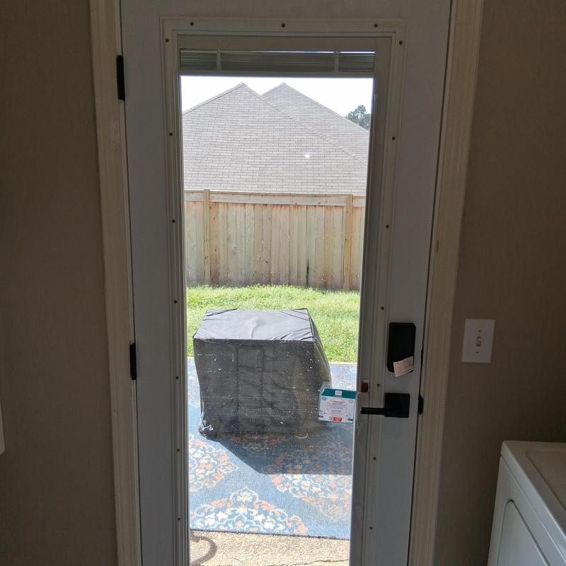 Exterior glass door with electronic keypad lock installed