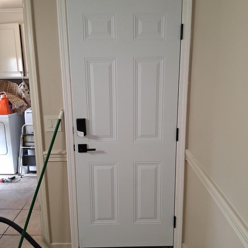 Exterior door with electronic keypad lock installation