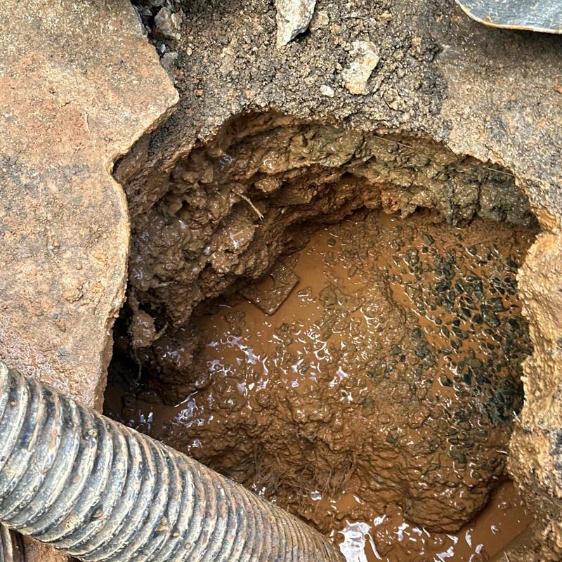 Underground plumbing excavation and mud removal site Underground plumbing excavation and mud removal site