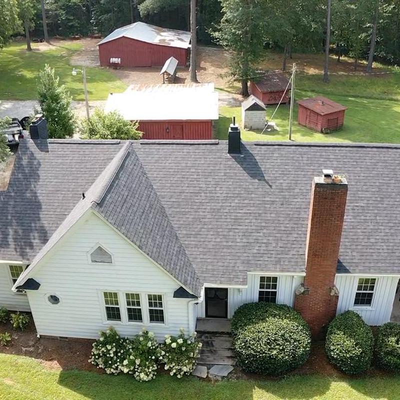 Owens Corning Onyx Black shingle roof with chimney