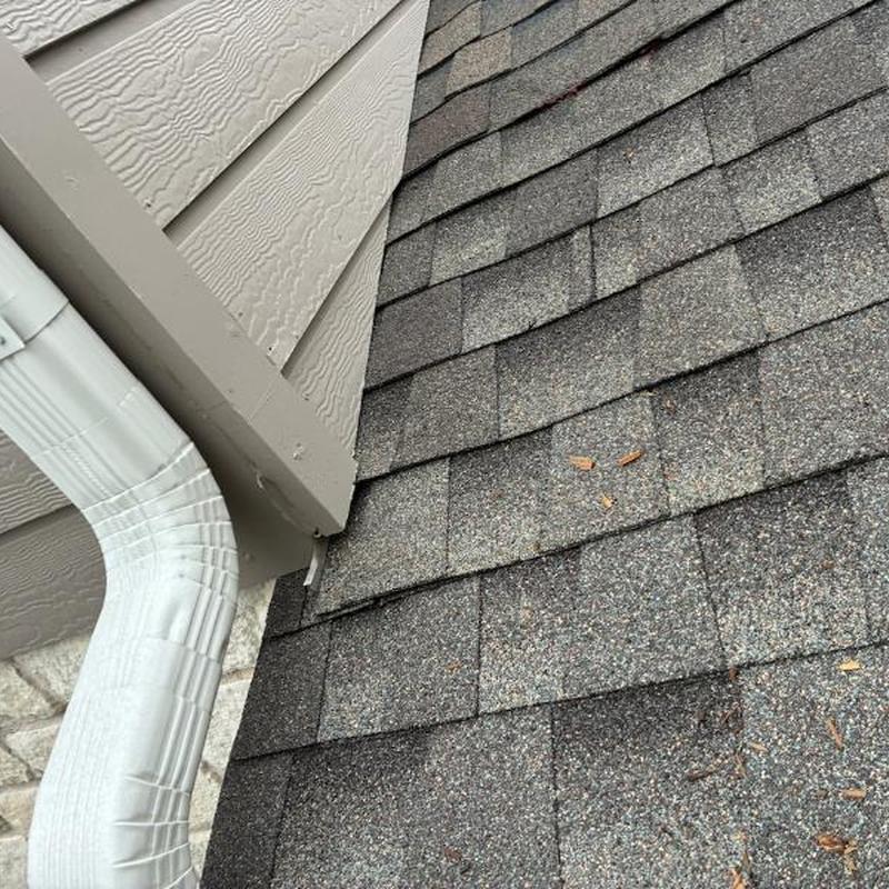 Weatherwood shingle roof with gutter and siding trim