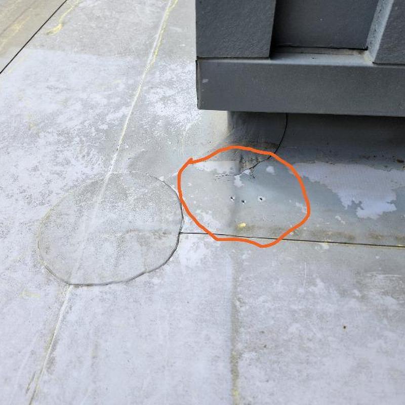 TPO membrane with holes and missing plumbing boot