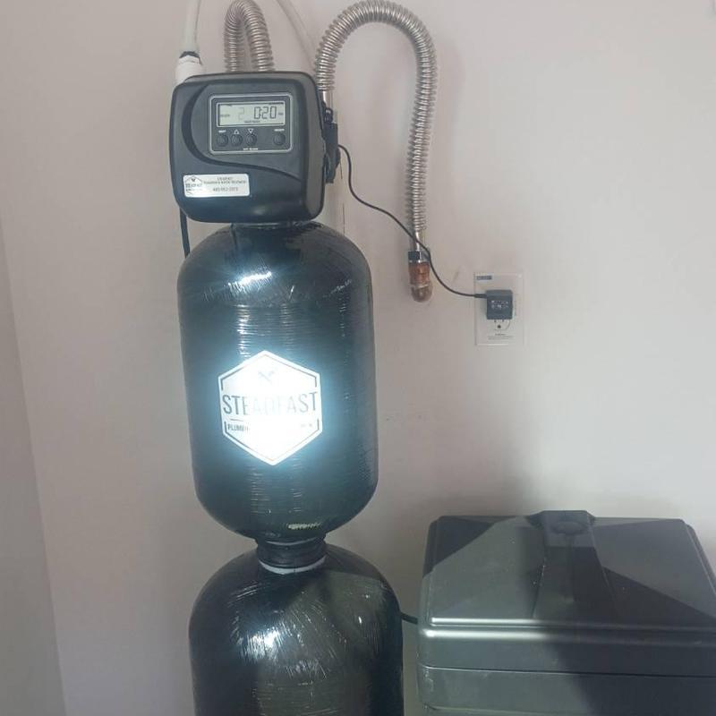 Green Titan water filtration system installation unit