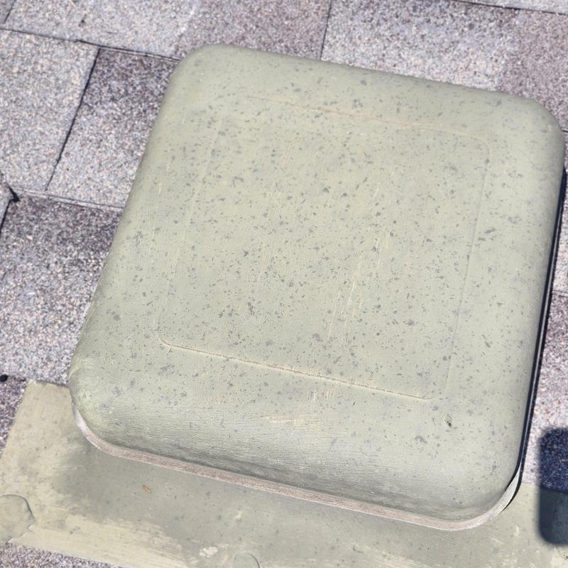 Roof vent cover with weathered shingles and granules