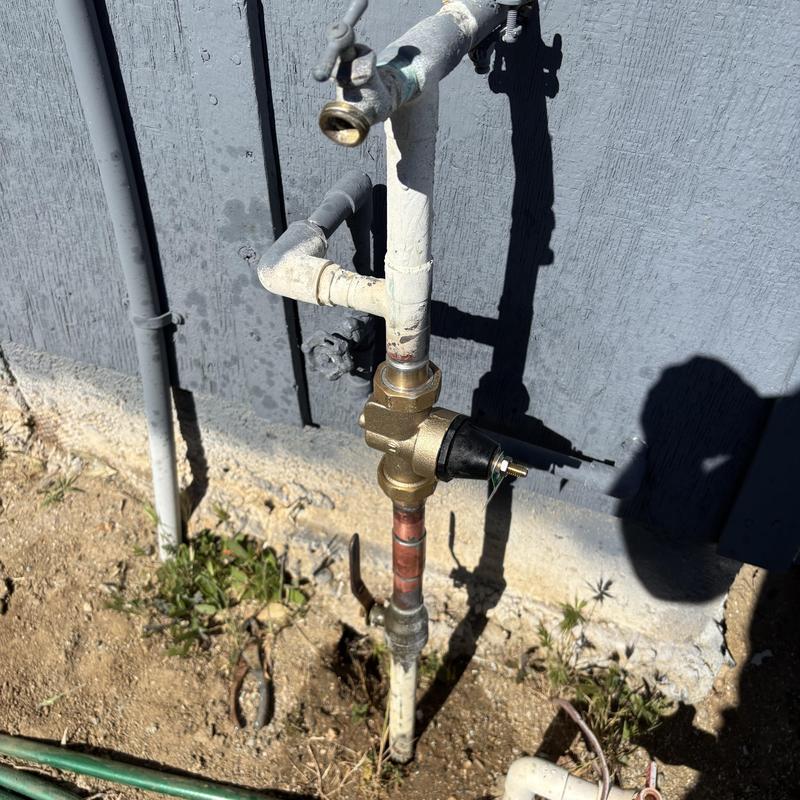 1-inch pressure regulator on outdoor hose bib pipe