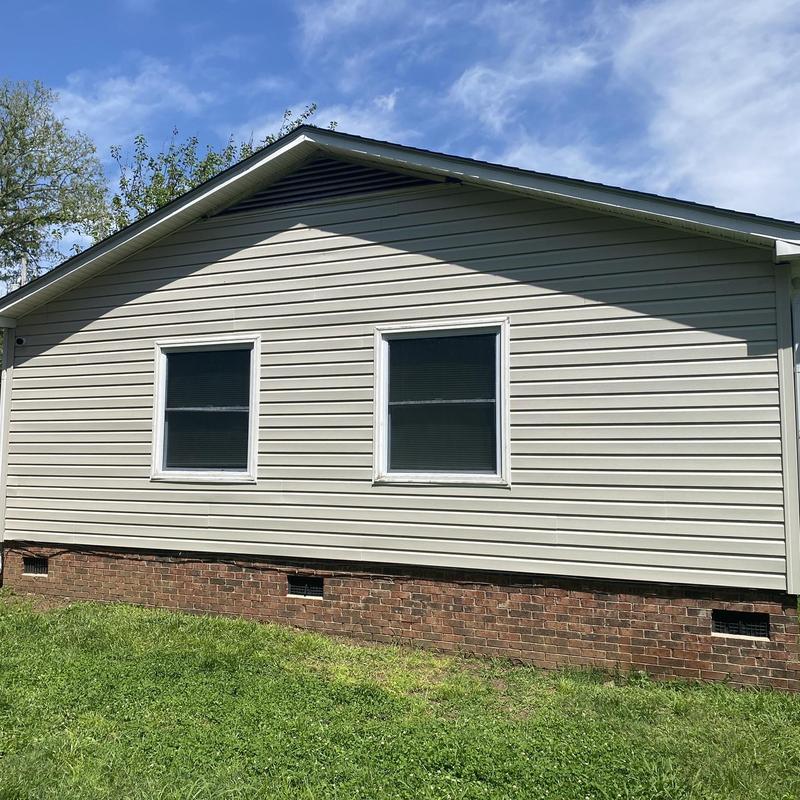Vinyl siding and windows on house exterior Vinyl siding and windows on house exterior