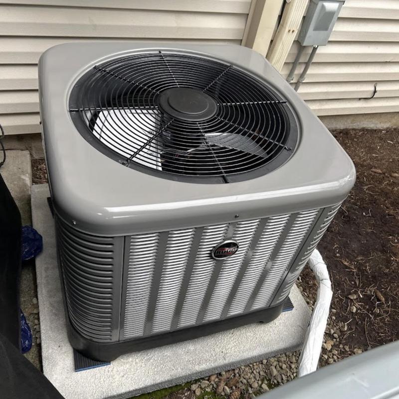 Ruud air conditioning system installed outdoors Ruud air conditioning system installed outdoors