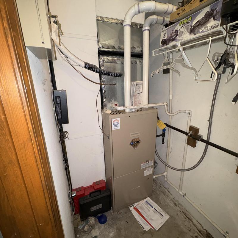 York gas furnace with PVC vent pipes in utility closet York gas furnace with PVC vent pipes in utility closet