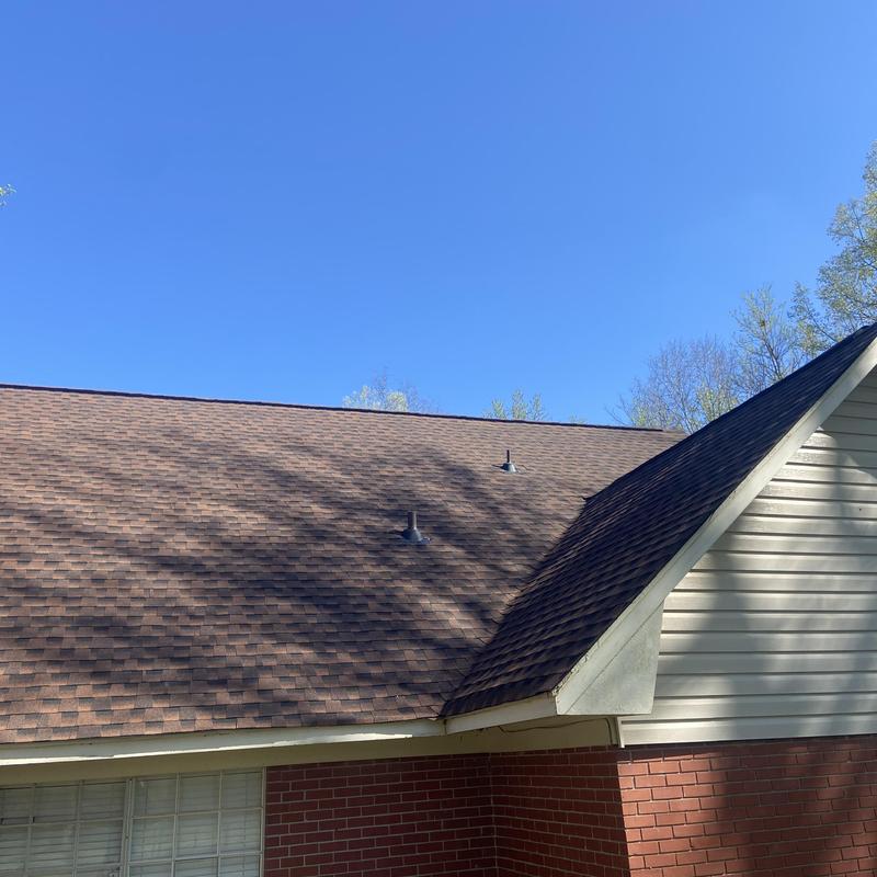 Architectural asphalt shingle roof with vent pipes