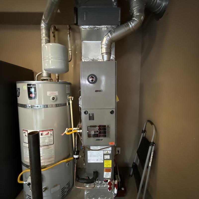 Ruud gas furnace with ductwork and water heater Ruud gas furnace with ductwork and water heater