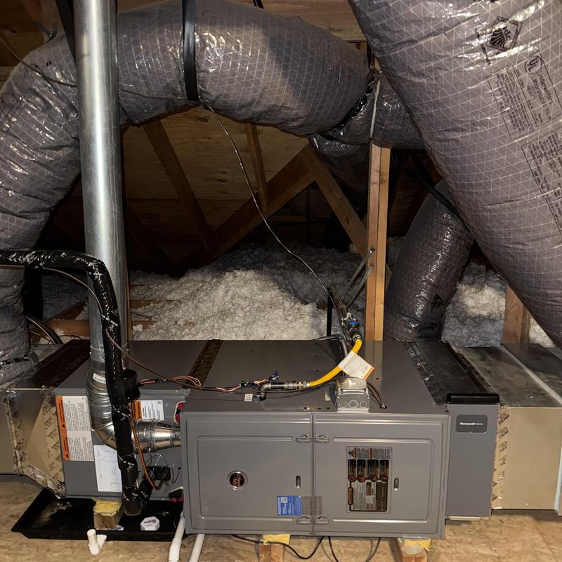 Ruud two-stage gas furnace with air ducts in attic Ruud two-stage gas furnace with air ducts in attic