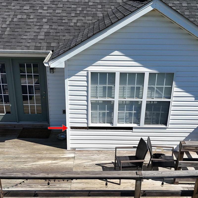 Vinyl siding gap under window on house exterior Vinyl siding gap under window on house exterior